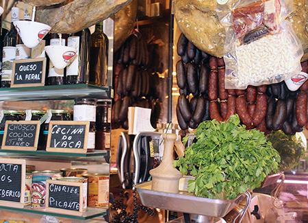 Vista del interior de la carnicería, dónde podemos ver pizarras para anunciar productos, embutidos, jamones, paquetes al vacío para hacer fabada y otros productos